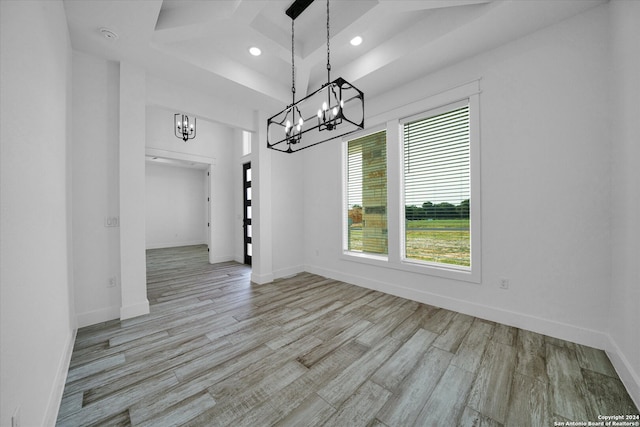 unfurnished dining area with light hardwood / wood-style flooring