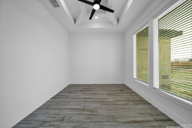 unfurnished room with hardwood / wood-style floors and ceiling fan