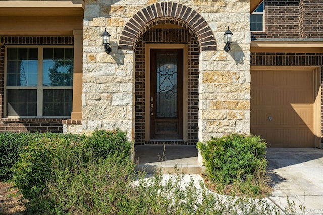 property entrance with a garage