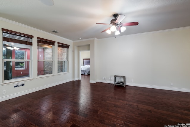 unfurnished living room featuring ceiling fan, ornamental molding, and dark hardwood / wood-style floors