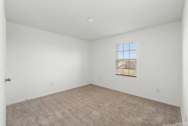 empty room with carpet floors