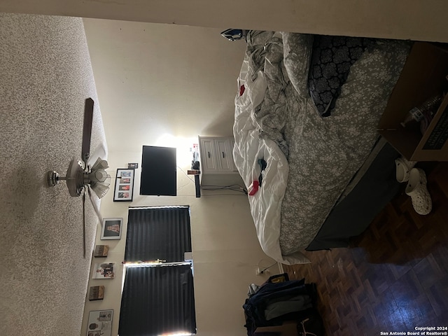 bedroom featuring hardwood / wood-style flooring