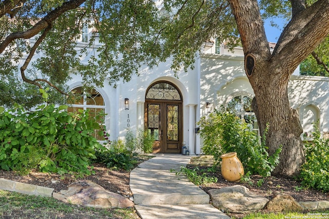 doorway to property with french doors