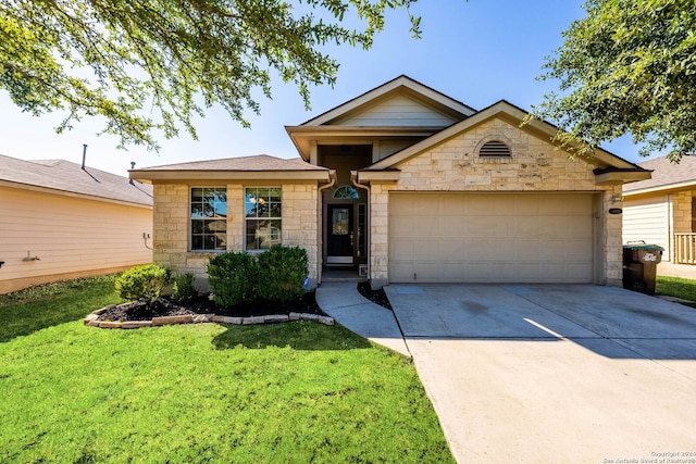 view of front facade featuring a front yard and a garage