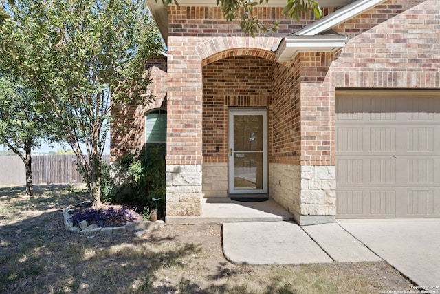 property entrance featuring a garage