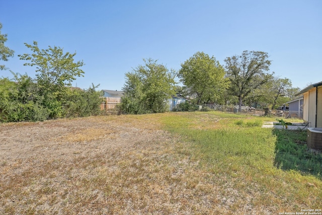 view of yard featuring cooling unit