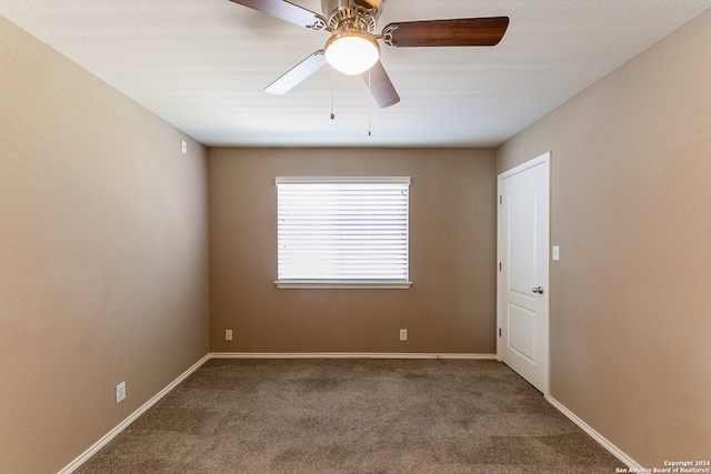 unfurnished room featuring carpet flooring and ceiling fan