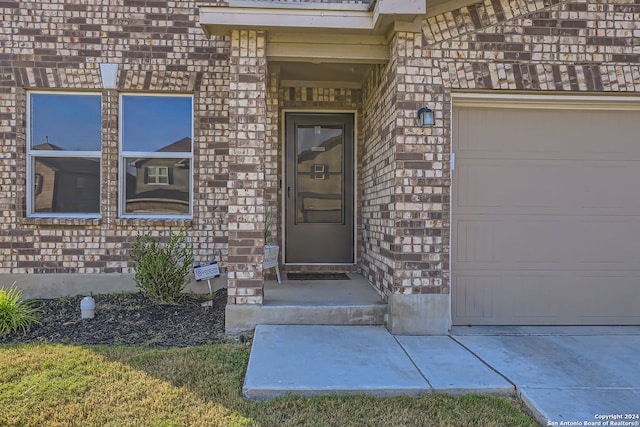 entrance to property with a garage