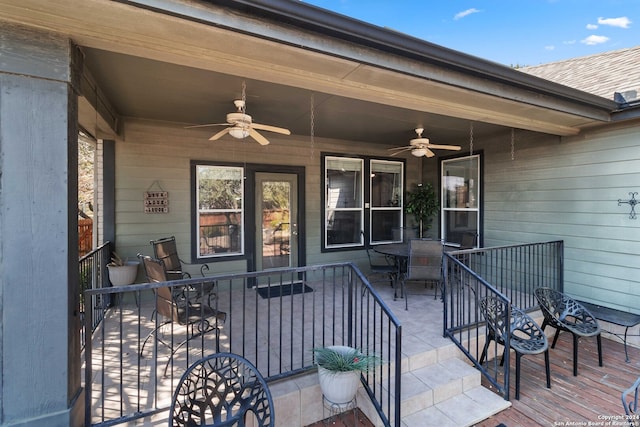 property entrance with ceiling fan