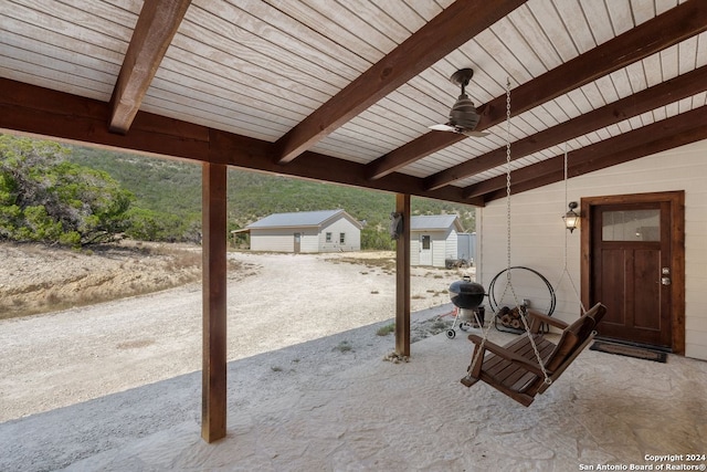 view of patio with ceiling fan