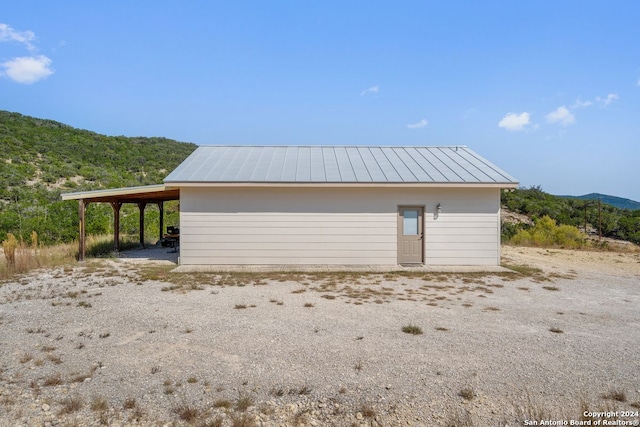 garage featuring a mountain view