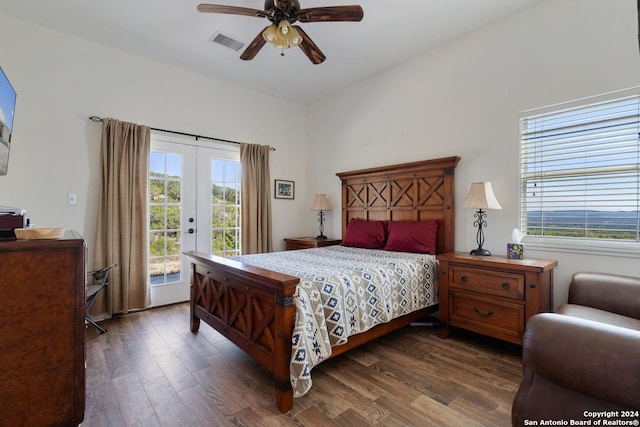 bedroom featuring access to outside, french doors, dark wood-type flooring, and ceiling fan