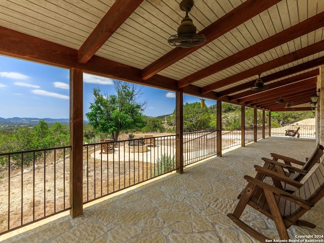 view of patio featuring ceiling fan