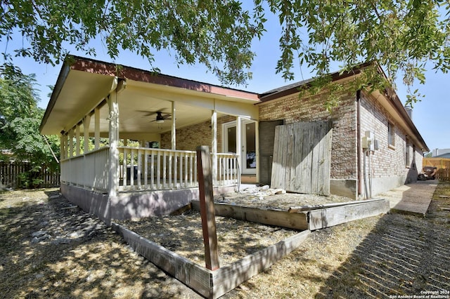 view of property exterior featuring ceiling fan