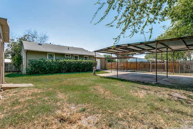 view of yard with a carport