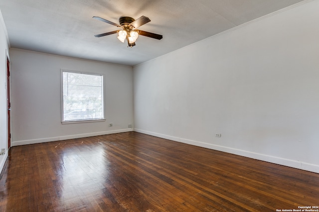 unfurnished room featuring ornamental molding, dark hardwood / wood-style floors, and ceiling fan