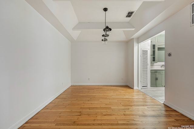 spare room with light wood-type flooring