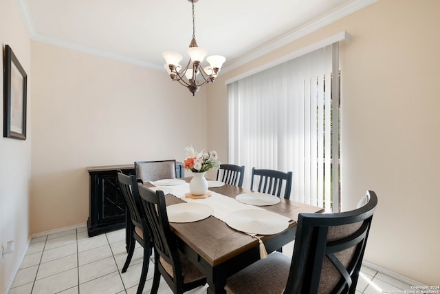 dining room with a chandelier, crown molding, and light tile patterned floors