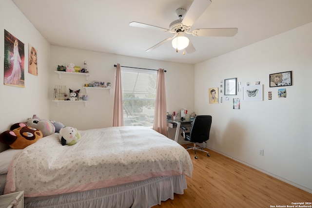 bedroom featuring light hardwood / wood-style floors and ceiling fan