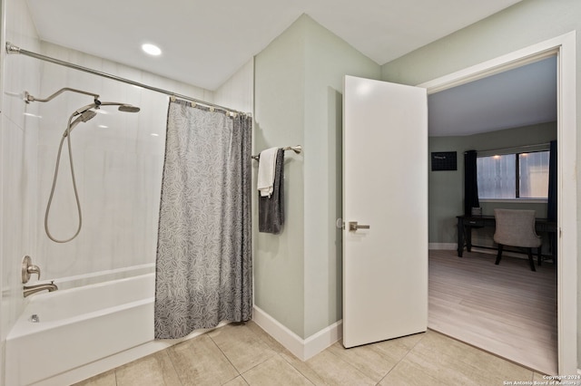 bathroom featuring shower / bath combination with curtain and wood-type flooring