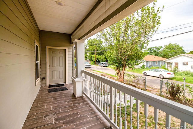 balcony featuring a porch