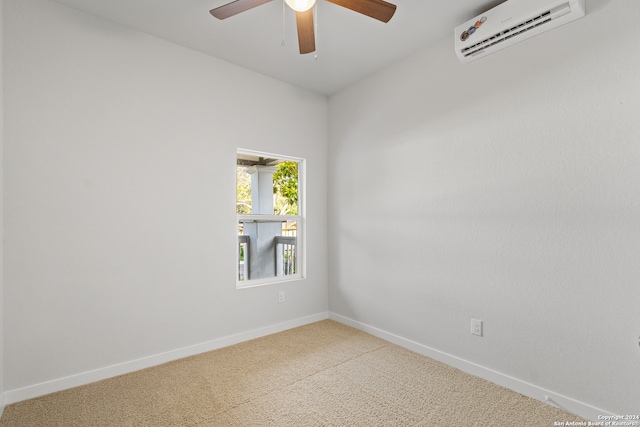 carpeted empty room featuring a wall mounted air conditioner and ceiling fan