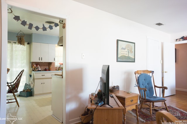 sitting room featuring light wood-type flooring