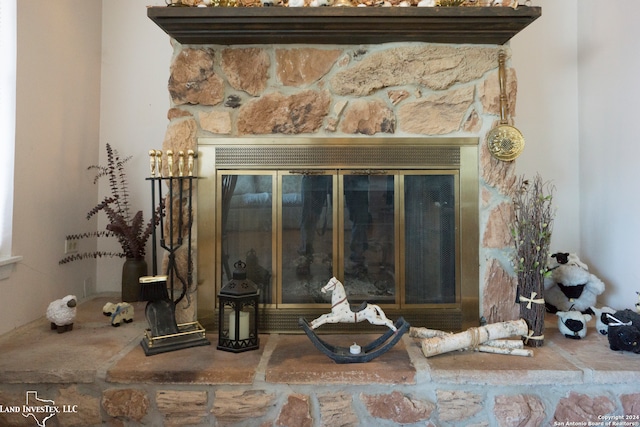 interior details with a fireplace