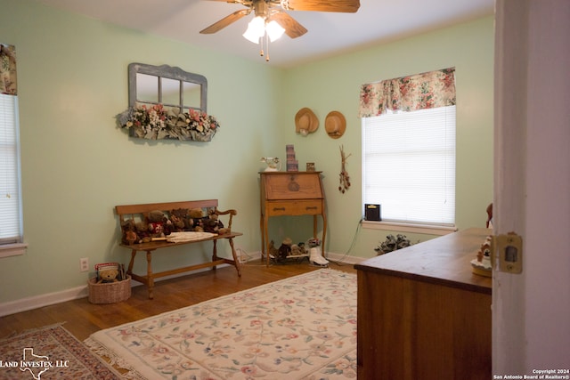 bedroom featuring wood-type flooring and ceiling fan