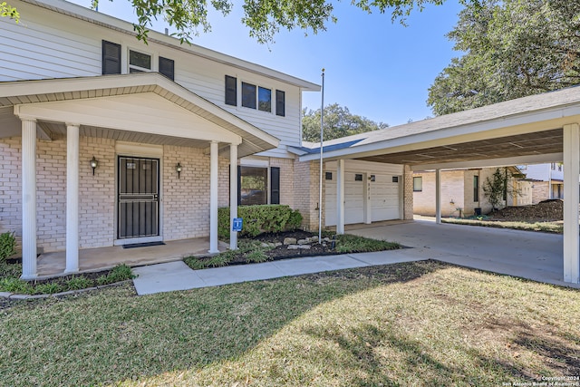 view of front facade featuring a carport, a porch, a front lawn, and a garage