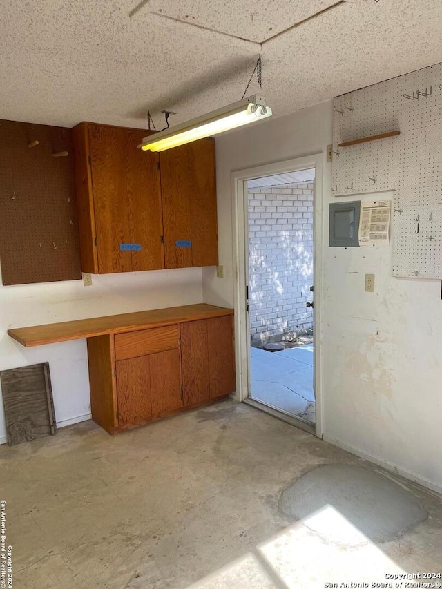 kitchen featuring a textured ceiling