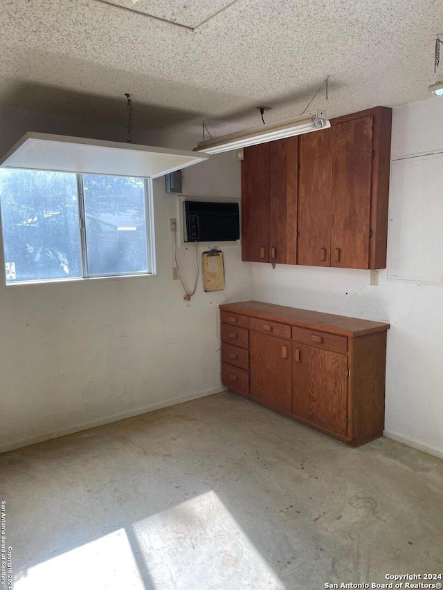 kitchen with a textured ceiling