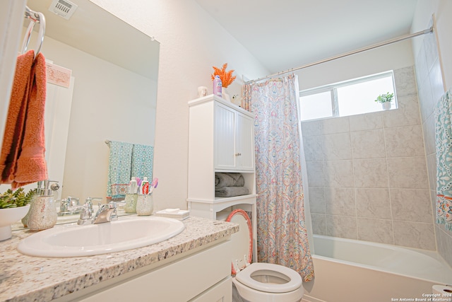 full bathroom featuring vanity, toilet, and shower / bathtub combination with curtain