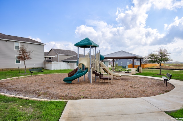 view of play area featuring a lawn