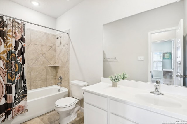 full bathroom featuring toilet, shower / bath combo with shower curtain, vanity, and tile patterned flooring