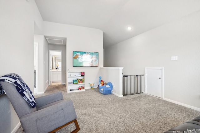 recreation room with carpet flooring