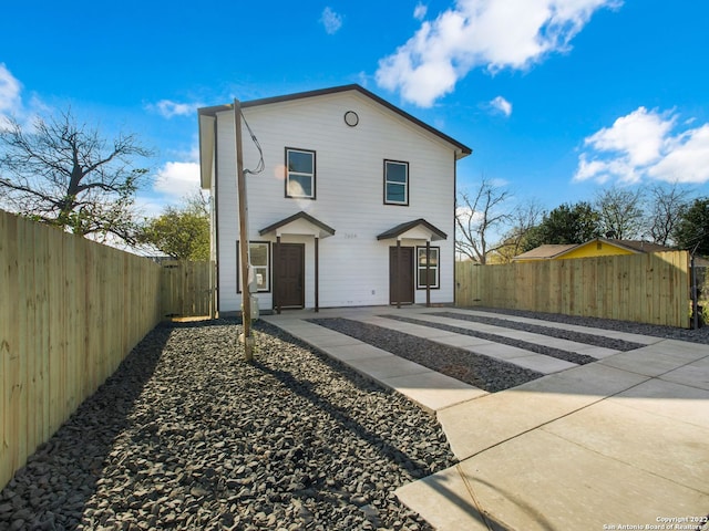 view of front of property with a patio