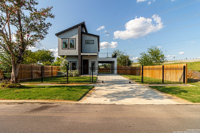 contemporary house with a front yard