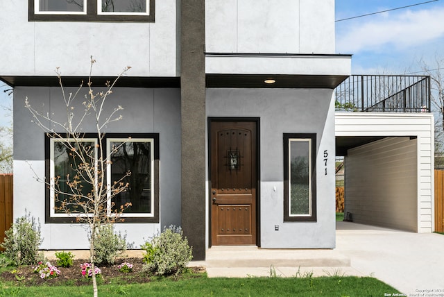 property entrance with a balcony