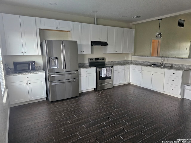 kitchen featuring sink, appliances with stainless steel finishes, and white cabinetry