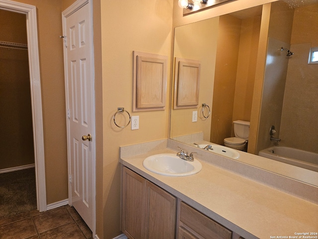 full bathroom with toilet, vanity, tile patterned floors, and shower / bath combination