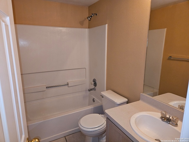 full bathroom with vanity, toilet, tile patterned floors, and shower / bathtub combination