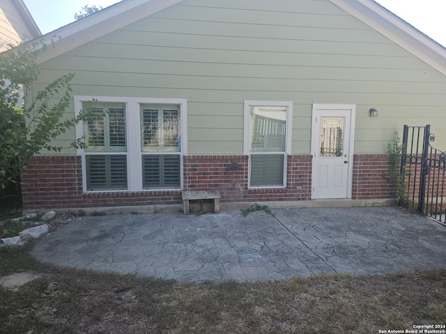 back of house featuring a patio area