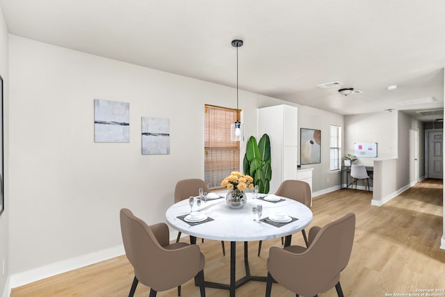 dining room featuring light wood-type flooring