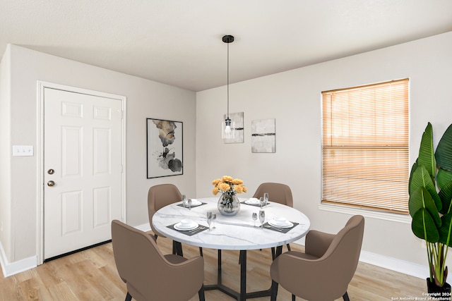 dining room featuring light hardwood / wood-style floors