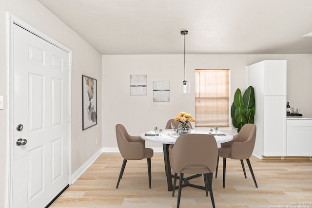 dining room featuring light hardwood / wood-style flooring