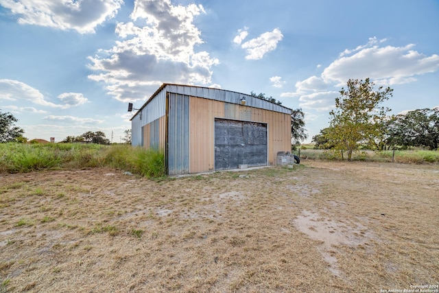 150 S Fisher Ln, Poteet, TX 78065 - view of outdoor structure featuring an outbuilding