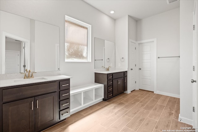 bathroom featuring vanity and wood-type flooring