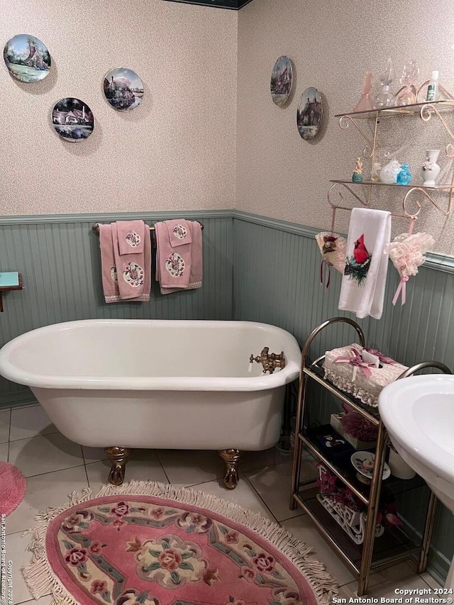 bathroom featuring a tub and tile patterned floors