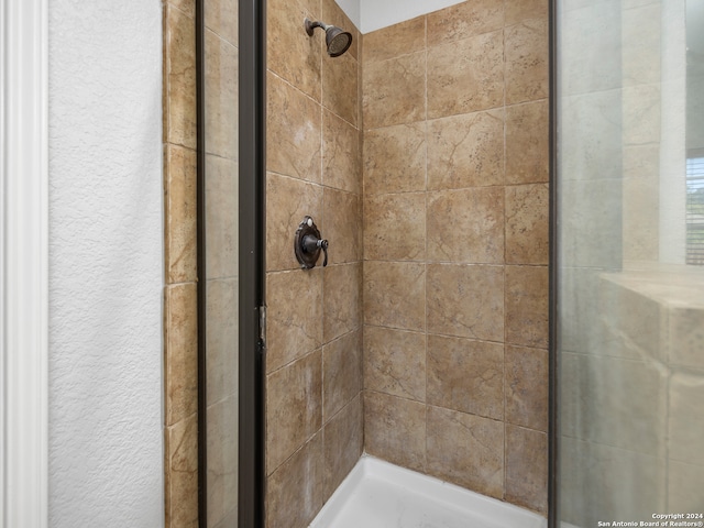 bathroom with an enclosed shower